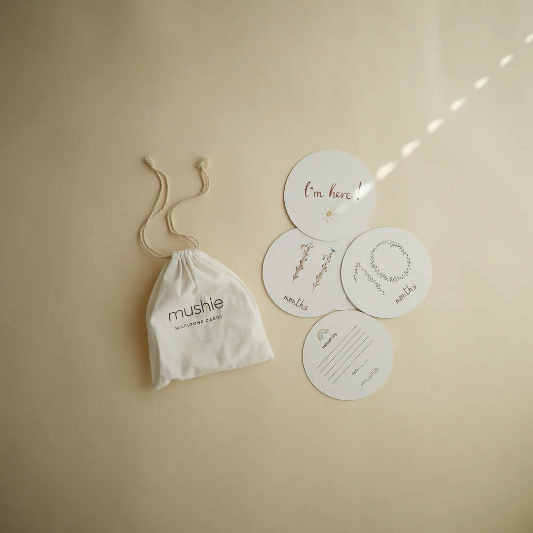 Milestone cards with weeks months and memories with bag from mushie